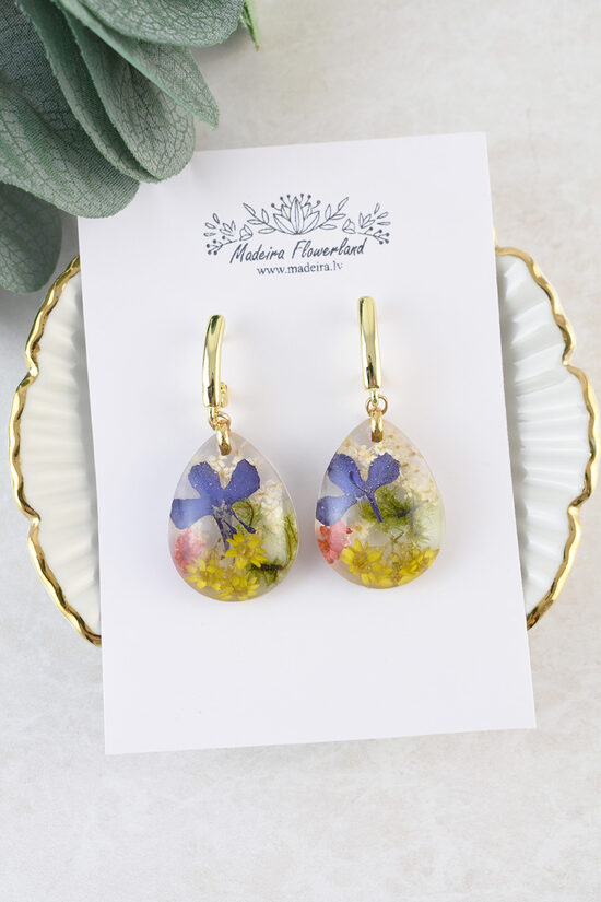 Caurspīdīgi auskari ar ziediem