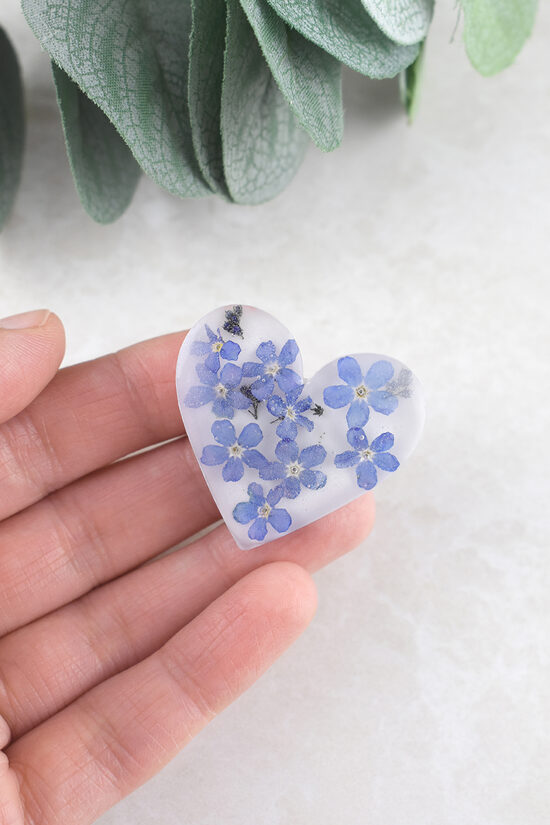 Piespraude ar neaizmirstulītēm