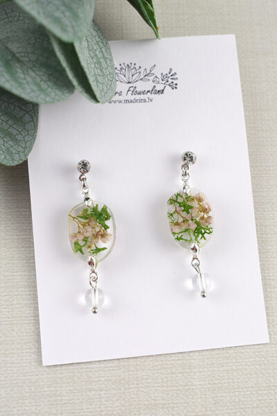 Caurspīdīgi auskari ar ziediem