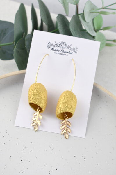 Gold colored cocoon earrings