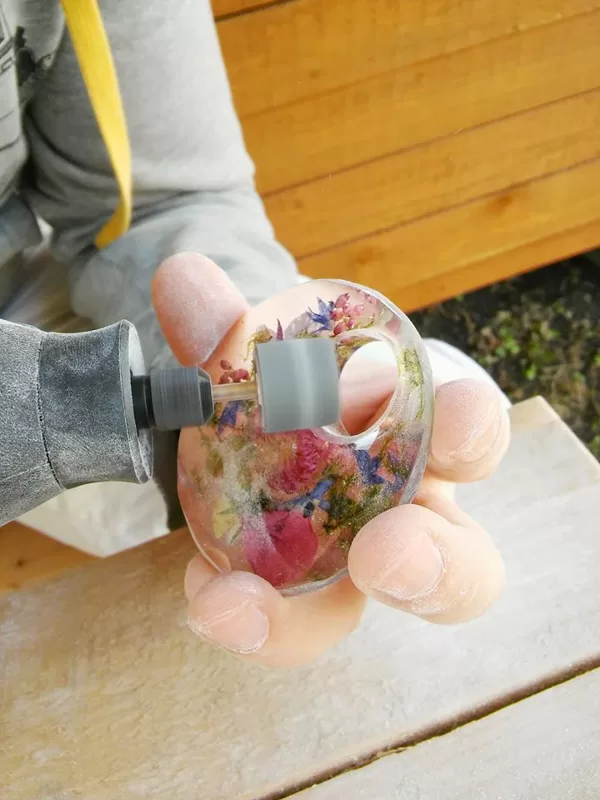 Sanding epoxy resin jewelry with dremel